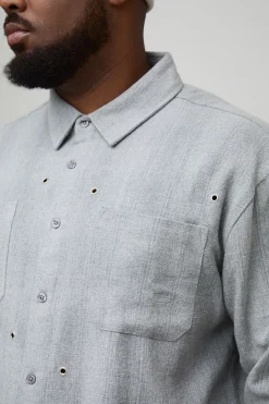 Chemise à carreaux en flanelle surdimensionnée à l'effet vieilli avec détails de quincaillerie