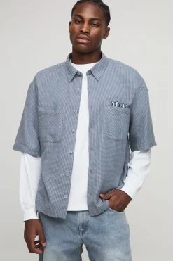 Chemise à carreaux oversize pour homme avec appliqué et superposition factice