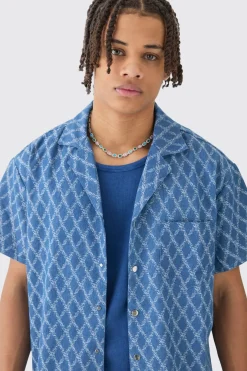 Chemise en denim à coupe boxy et à tissu intéressant