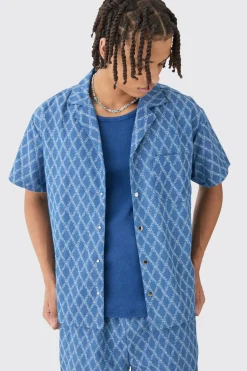 Chemise en denim à coupe boxy et à tissu intéressant