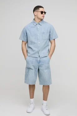 Chemise en denim distressed à col boxy