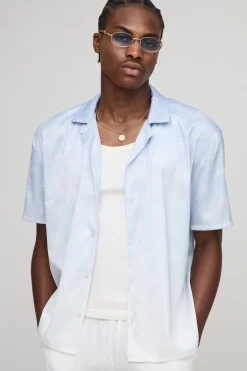 Chemise en satin à imprimé monogramme oversize