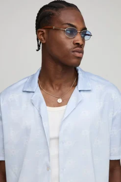 Chemise en satin à imprimé monogramme oversize