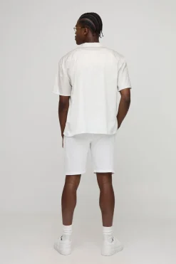 Chemise en satin oversize à imprimé monogramme