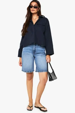Chemise en sergé à col et poignets fendus