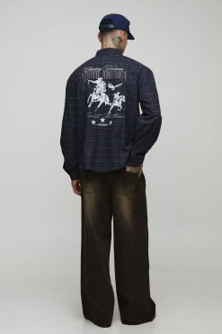 Chemise longue surdimensionnée à la coupe carrée, brossée, à carreaux et brodée