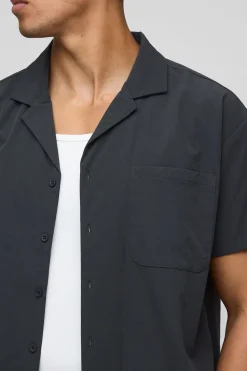 Chemise à manches courtes stretch, coupe boxy