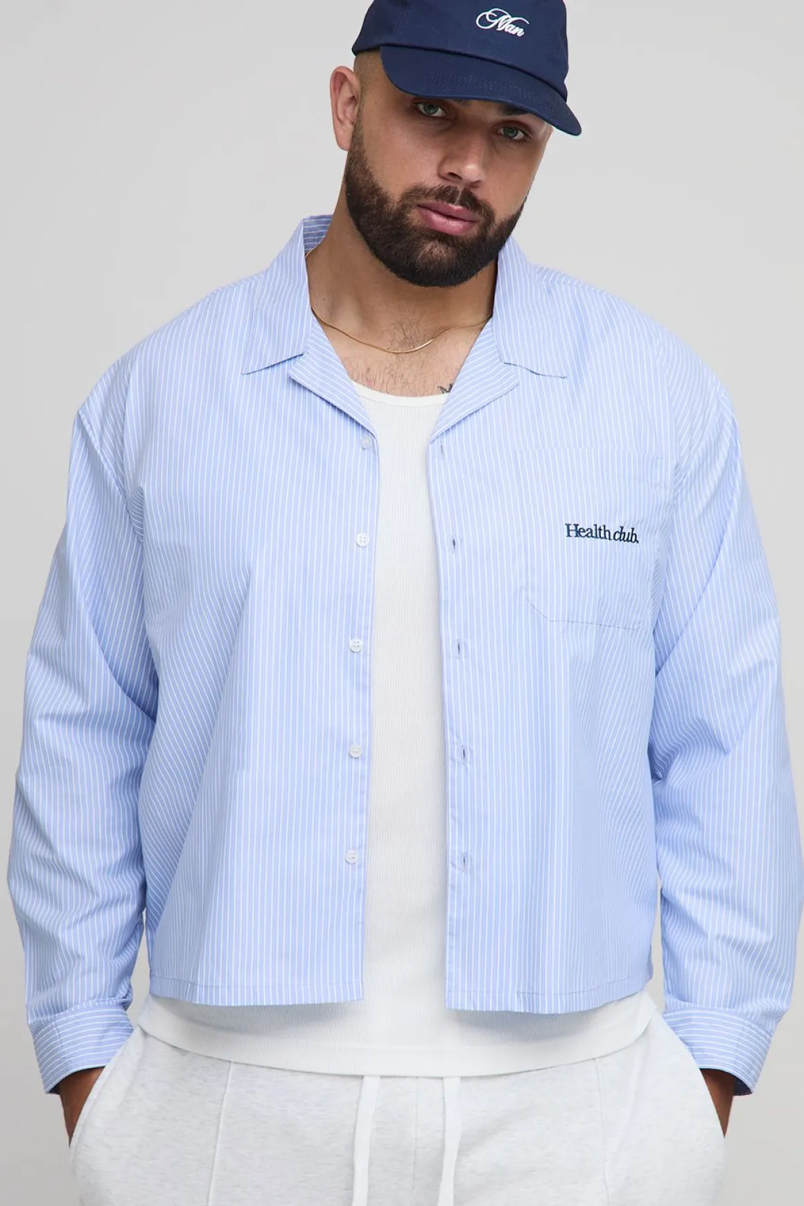Chemise à manches longues rayée, surdimensionnée et carrée du club de fitness Plus