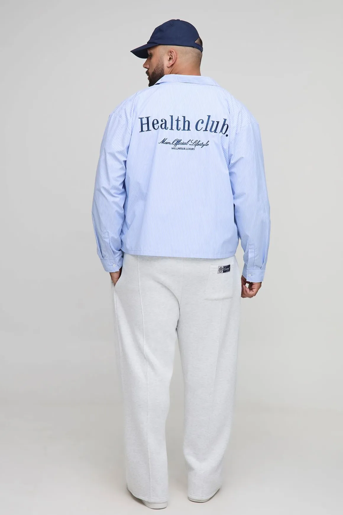 Chemise à manches longues rayée, surdimensionnée et carrée du club de fitness Plus