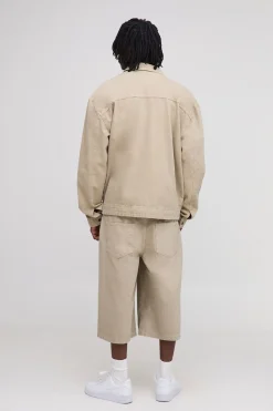 Chemise overshirt en denim lavé à fermeture éclair, version longue