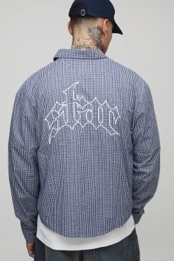 Chemise oversize à coupe boxy, brodée avec des micro-carreaux