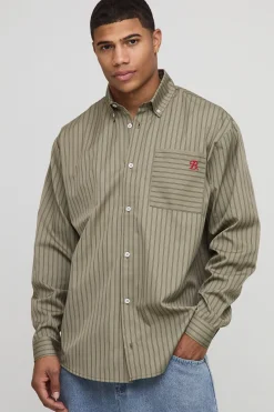 Chemise oversize à manches longues à rayures et ourlet incurvé