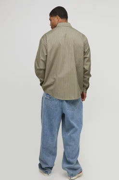 Chemise oversize à manches longues à rayures et ourlet incurvé