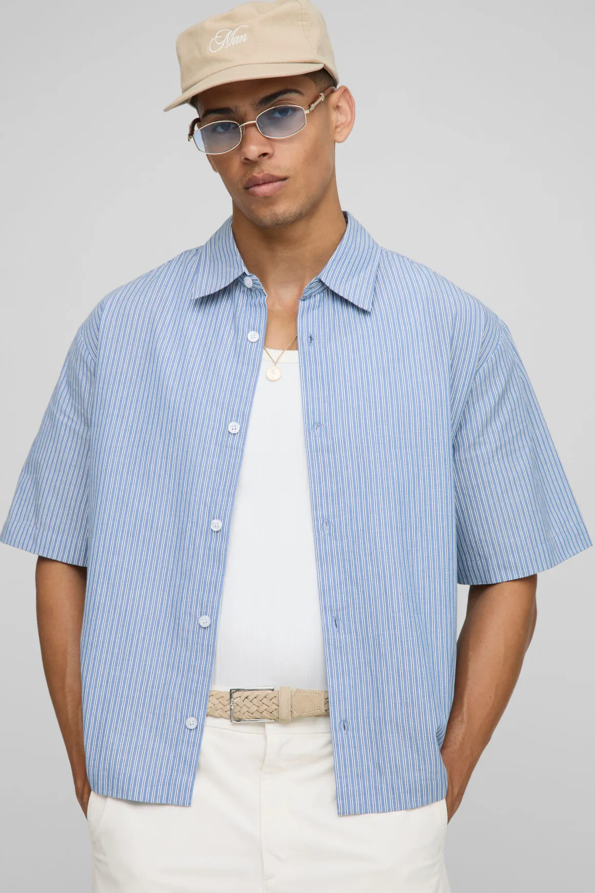 Chemise oversize à manches mi-longues à col rayé