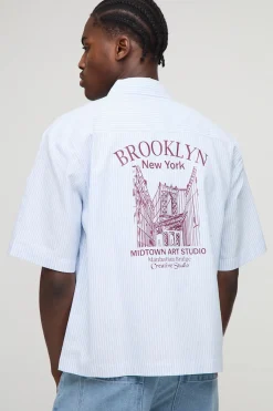 Chemise oversize New York à rayures brodées