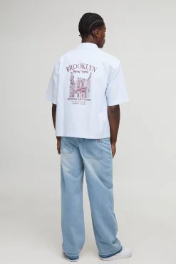 Chemise oversize New York à rayures brodées