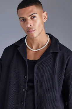 Chemise plissée à manches courtes, coupe surdimensionnée Revere