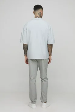 Chemise Revere technique stretch, longue et surdimensionnée