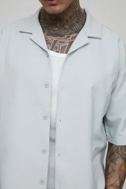 Chemise Revere technique stretch, longue et surdimensionnée