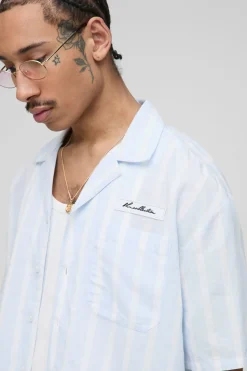 Chemise surdimensionnée au style lin boxy, rayures et détails de poche