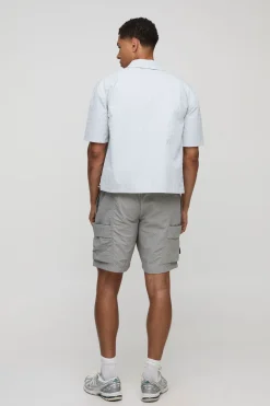 Chemise surdimensionnée, coupe boxy, à carreaux techniques et ourlet élastique Bungee