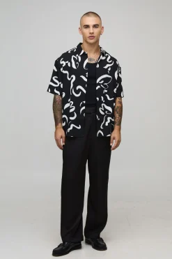 Chemise surdimensionnée à manches courtes à imprimé abstrait