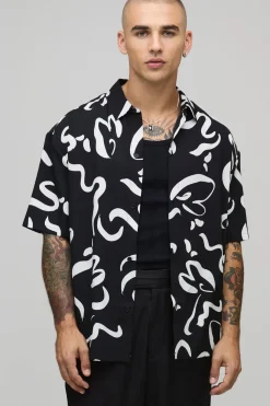 Chemise surdimensionnée à manches courtes à imprimé abstrait