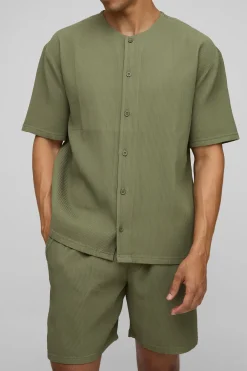 Chemise surdimensionnée sans col à manches courtes plissée