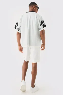 Chemise tricotée à dessin linéaire, coupe carrée