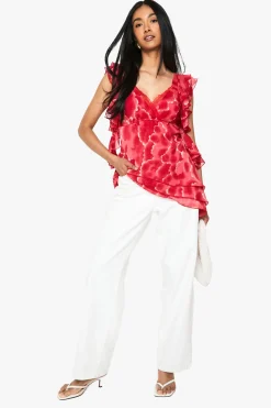Chemisier asymétrique en chiffon floral à volants