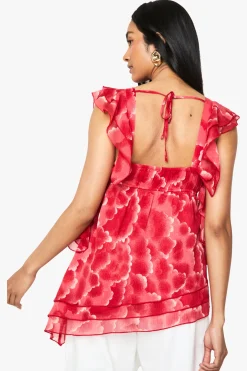 Chemisier asymétrique en chiffon floral à volants