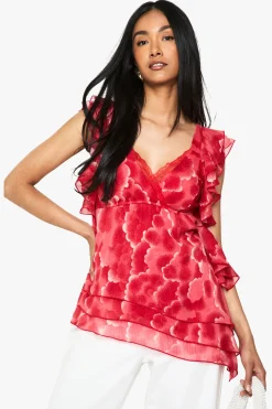 Chemisier asymétrique en chiffon floral à volants