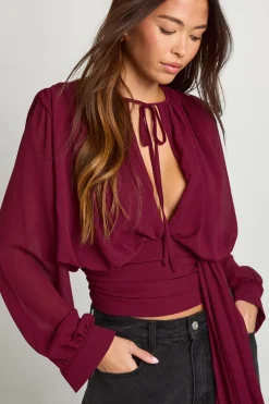 Chemisier drapé en chiffon à décolleté plongeant