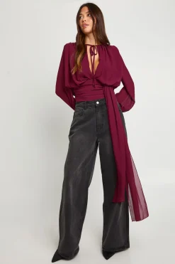 Chemisier drapé en chiffon à décolleté plongeant