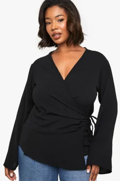boohoo CHEMISIER À MANCHES LONGUES PLUS ASYMETRIQUE AVEC NOEUD SUR LE DEVANT<Femme Tops