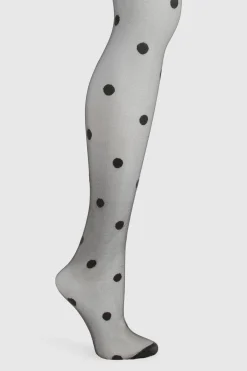Collants transparents à gros pois
