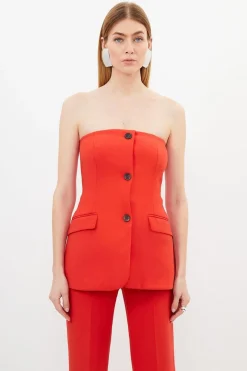 Combinaison ajustée à boutons avec bustier court en stretch compact