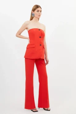 Combinaison ajustée à boutons avec bustier court en stretch compact