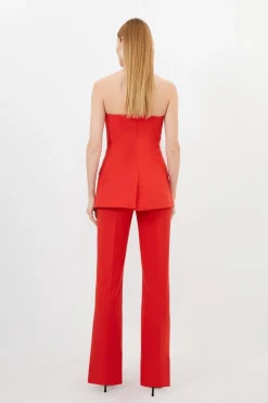 Combinaison ajustée à boutons avec bustier court en stretch compact