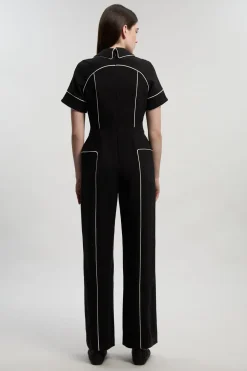 Combinaison Ajustée à Détails Contrastés et Pattes Boutonnées en Tissu Stretch Compact