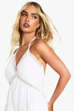 Combinaison en coton à décolleté halter avec volant et finition en dentelle