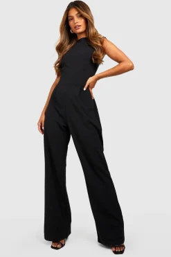 Combinaison sur mesure à col haut, taille cintrée et jambes larges