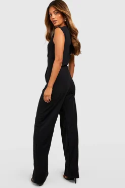 Combinaison sur mesure à col haut, taille cintrée et jambes larges