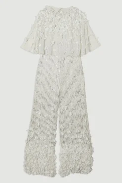 Combinaison tissée à manches d'ange avec appliqué de cristal