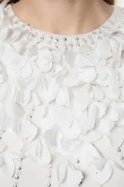 Combinaison tissée à manches d'ange avec appliqué de cristal