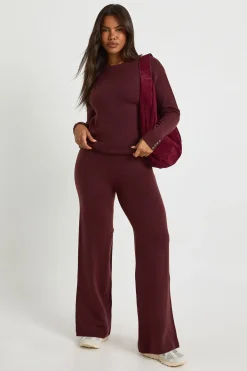 Coordonné pull-over oversize ultra-doux avec détails de manchette boutonnée et pantalon à jambes larges
