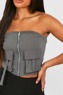 Corset utilitaire en bengaline avec poche et fermeture éclair centrale