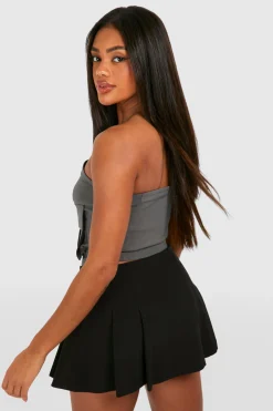 Corset utilitaire en bengaline avec poche et fermeture éclair centrale