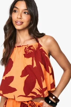 Crop top halterneck à imprimé floral abstrait
