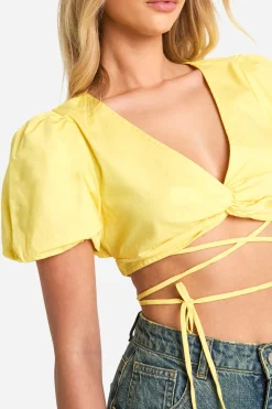 Crop top à nouer à l'avant avec manches bouffantes